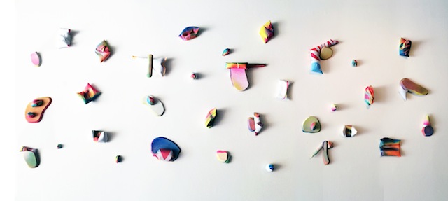 \"scatter wall constellation,\" (collection of thirty-three), 2014, spray paint on stuffed PVC-coated canvas tarpaulin, plywood, and plaster, approx 12\" x 24\" x 2\"